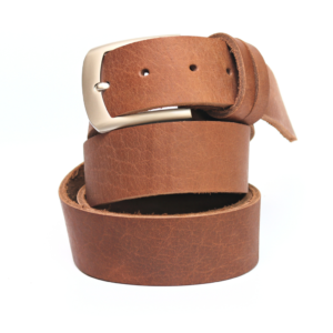 Raw and Tough Brown leather belt for men, in authentic buffalo’s hide. A genuine leather product in raw finishing. River bison mild leather belt manufactured by MENDER from Multan, Pakistan. Available across the globe. Raw finished 100% buffalo leather 2″ Width 4.5mm thickness durable metallic buckle Casual Wear with jeans