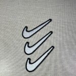Description: Enhance your sporty style with this set of (3) Sports Logo/Emblem Embroidered Iron-On Patches featuring a sleek white swoosh design. Sized at 2" x 0.75", these patches offer a nice touch of athletic elegance. Easily personalize your gear or apparel with these high-quality patches, perfect for showcasing your passion for sports in a subtle and stylish way. Order now for a winning look!