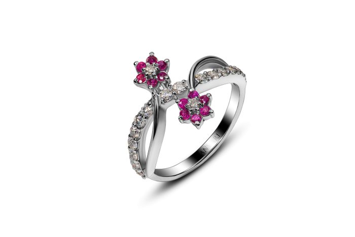 Infinity Ruby Knot Ring featuring natural Ruby and Zirconia accents in Sterling Silver