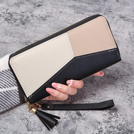 Fashion zipper long wallet for women in PU leather, available in black, blue, and pink.