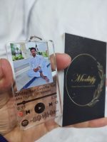 Customized transparent acrylic music keychain featuring song title and photo