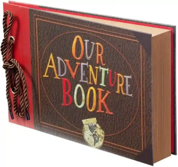 Our Adventure Book Scrapbook with embossed hard cover for DIY photo memories of weddings, travel, and anniversaries.