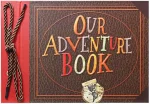 Our Adventure Book Scrapbook with embossed hard cover for DIY photo memories of weddings, travel, and anniversaries.