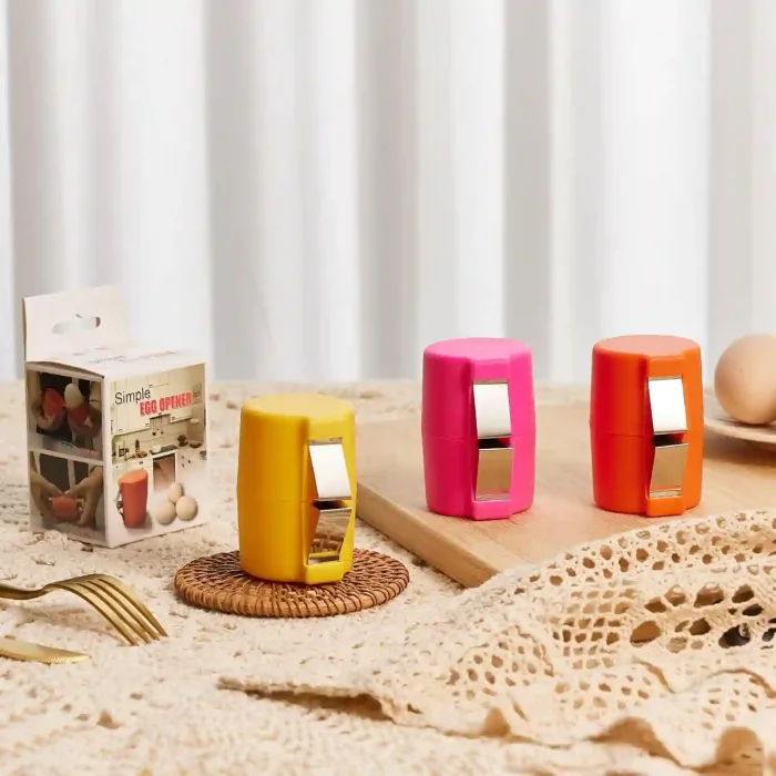 Eparé Egg Cups with stainless steel egg topper, spoons, egg holders, and a color-changing timer for soft boiled eggs