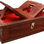 Intricately carved wooden Quran box with brass accents, crafted from shisham wood, perfect for home decor and Islamic gifts.
