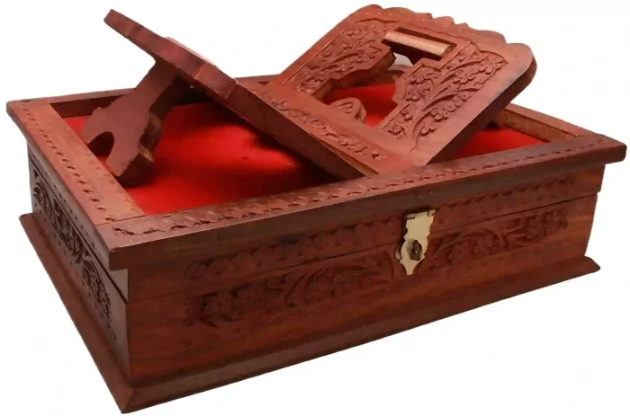 Intricately carved wooden Quran box with brass accents, crafted from shisham wood, perfect for home decor and Islamic gifts.