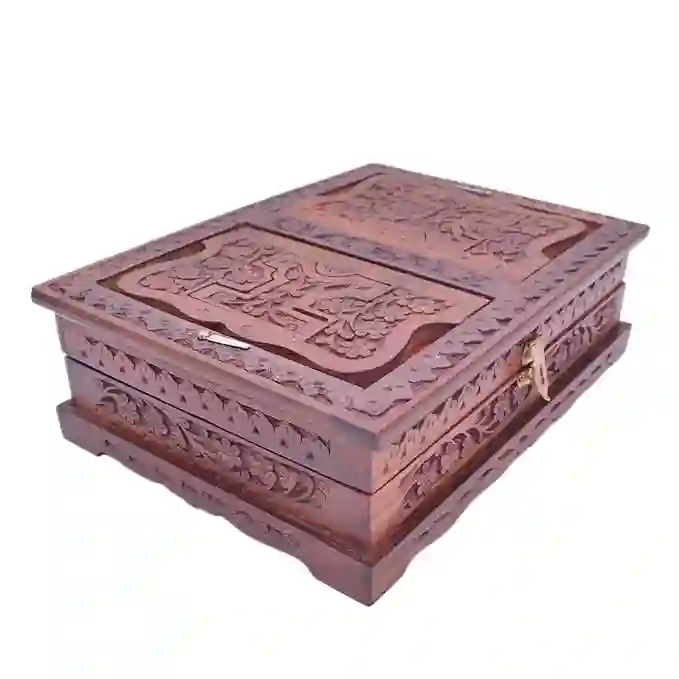 Intricately carved wooden Quran box with brass accents, crafted from shisham wood, perfect for home decor and Islamic gifts.