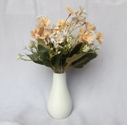 Handmade mini cement vase with matte white finish, ideal for dried flowers and home décor.