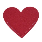 Handmade leather heart bookmark in assorted colors, a stylish and durable page corner marker for books and journals.