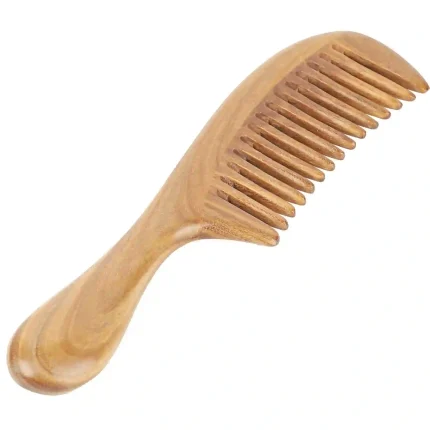 Handmade natural green sandalwood hair comb with wide teeth, perfect for detangling all hair types.