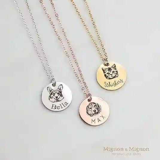 Custom pet portrait necklace with gold-plated stainless steel chain, featuring engraved pet face and name.