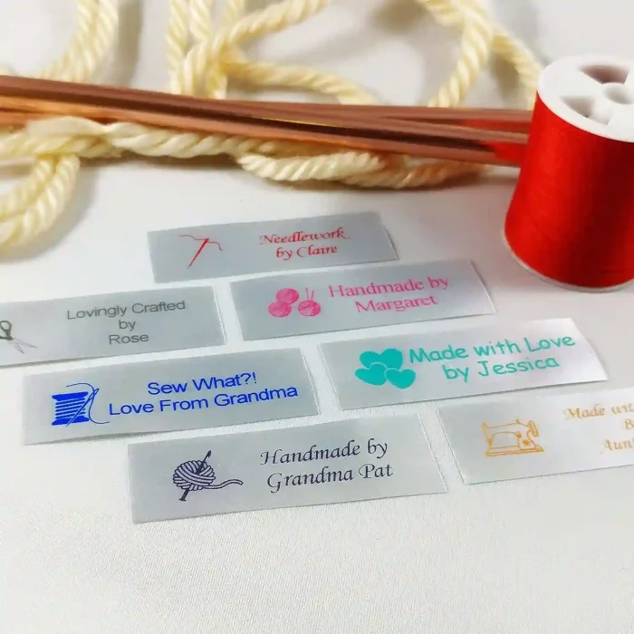 Custom satin sewing labels in 3/4" x 2 1/2" size, perfect for knitting, quilting, and sewing crafts.